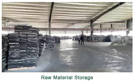 Bulk raw material and compound storage area inside our industrial rubber sheet factory.