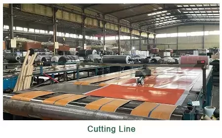 Automated slitting and width cutting machine processing rubber sheet rolls to custom specifications.