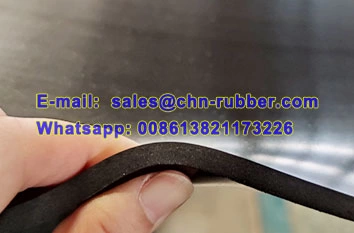 Smooth High Voltage Rubber Mats Switchboard Installation Certified smooth surface high voltage rubber mats laid in front of an industrial power distribution panel to prevent electrical shock.