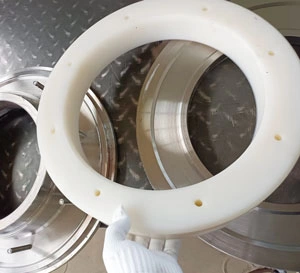 Custom-cut rubber shapes, washers, and industrial seals fabricated from diverse elastomer compounds (EPDM, NBR, Neoprene, Viton) tailored to custom CAD specifications. Assortment of custom die-cut rubber gaskets and molded parts in EPDM, NBR, Viton, and Neoprene materials